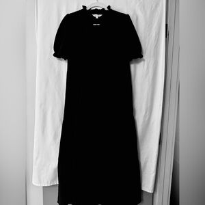 Long black dress, seer sucker material.